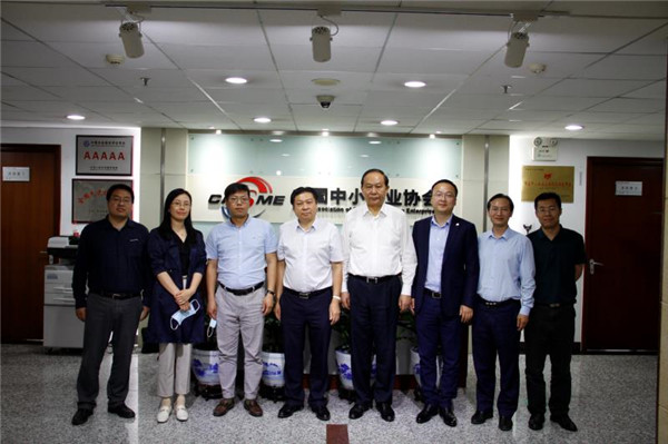 張競強執行會長會見中國平安集團智慧城市發展辦公室聯席秘書長楊建權一行_副本.jpg